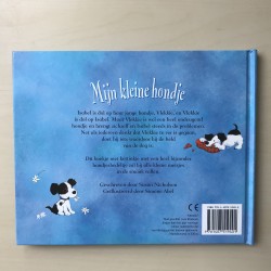 Mijn kleine hondje, met een kettinkje met hondjesbedeltje