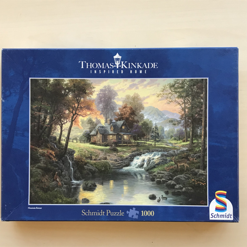 Thomas Kinkade : Houten huis langs. De beek.  1000 stukjes