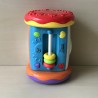 Speelrol met muziek. Hoogte 20 cm. Diameter 14 cm.