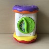 Speelrol met muziek. Hoogte 20 cm. Diameter 14 cm.