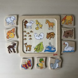 Goki : houten puzzel van 9 stukjes met dieren.
