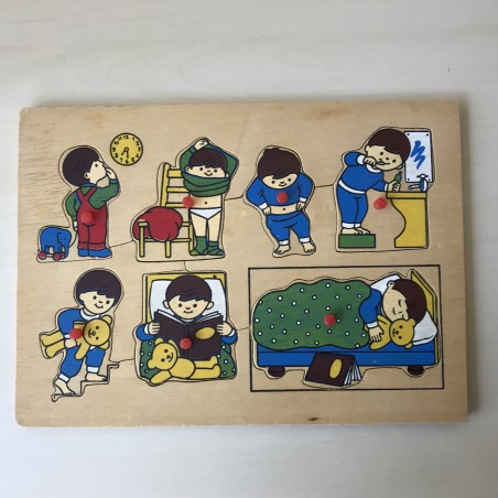 Puzzelplankje Knopjespuzzel : Verloop van de dag. 8 stukjes.
