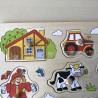 Puzzelplankje Knopjespuzzel Goki : 9 stukjes.