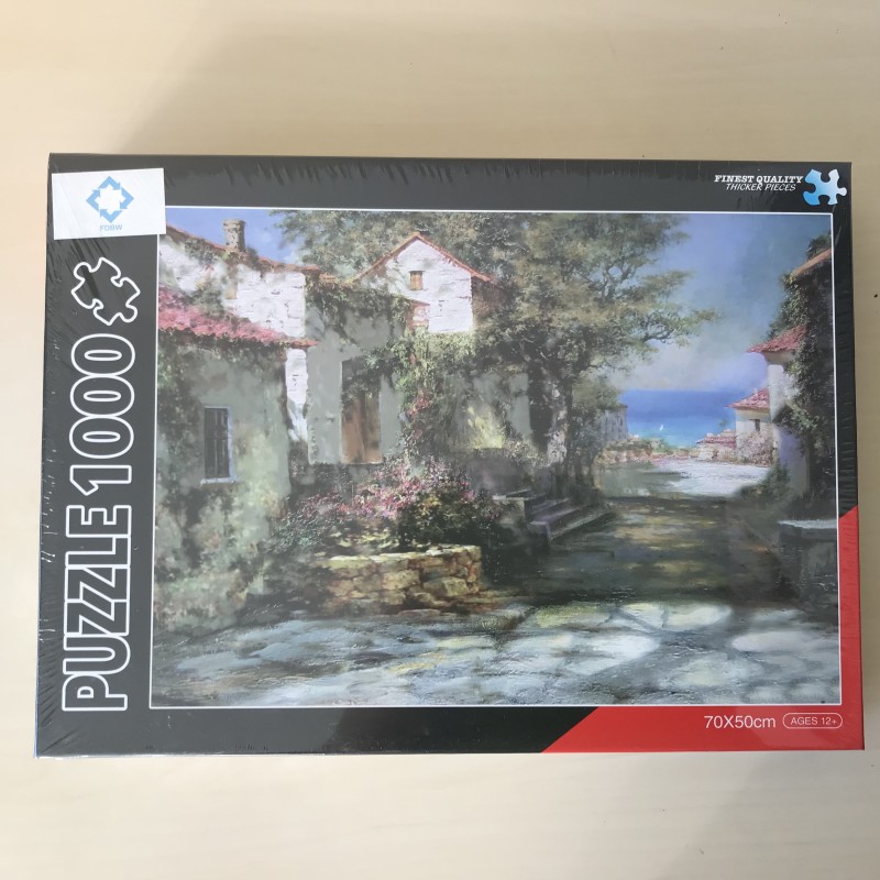 Puzzel : Nieuw. 1000 stukjes. Huisje aan zee.