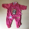 Poppen :  Roze boxpak.