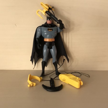 Batman, met allerlei attributen.