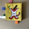 Stoffen boekje met peer op voorzijde : Stoffen boekje. 14 x 14 cm.
