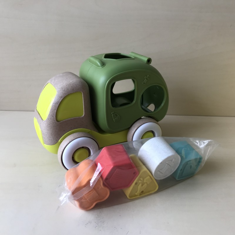 Vormenstoof in de vorm van een vuilniswagen.