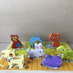 Puzzelplankje Knopjespuzzel : 7 stukjes.