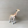 Giraffe.  16 cm. lang en 16 cm. hoog.