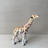 Giraffe.  16 cm. lang en 16 cm. hoog.