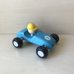 Blauwe houten auto.