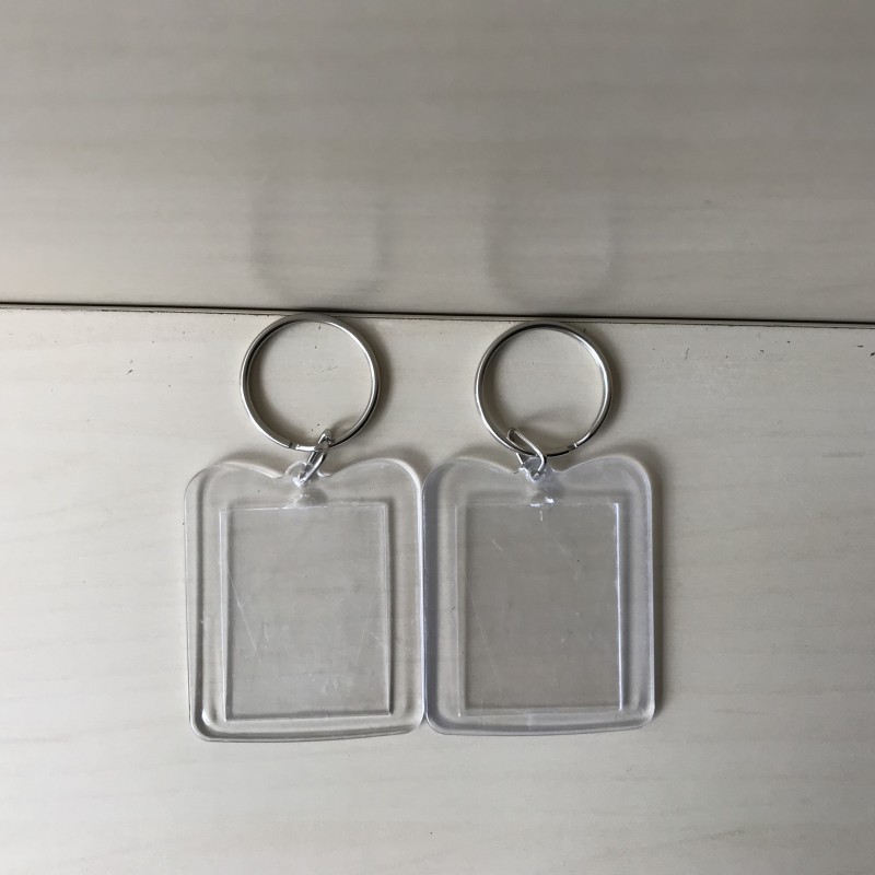 2 Sleutelhangers / fotolijstjes.