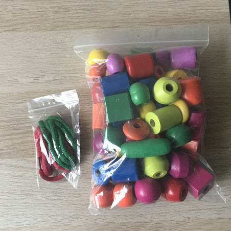 Grote houten kralen met rijgveters