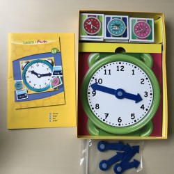 The clock . Leren klokkijken