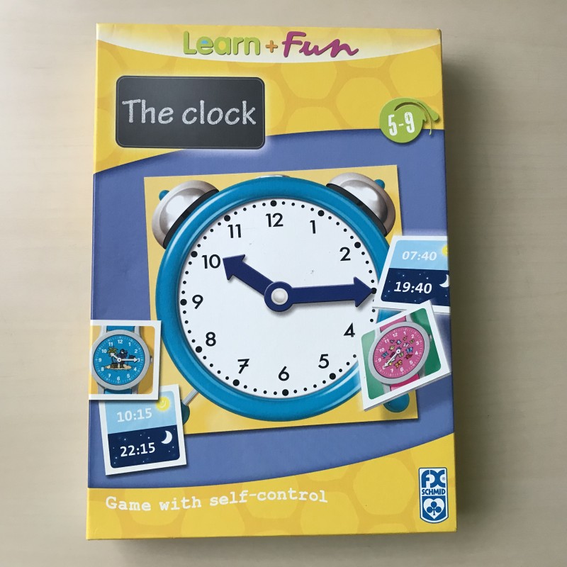 The clock . Leren klokkijken