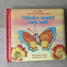 Vlinder neemt een bad