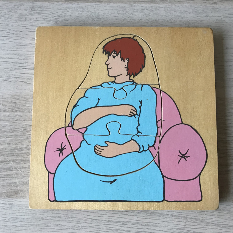Houten puzzel. Zwangerschap