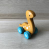 Plantoys : 1 kleine dino op wielen