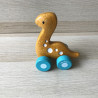 Plantoys : 1 kleine dino op wielen