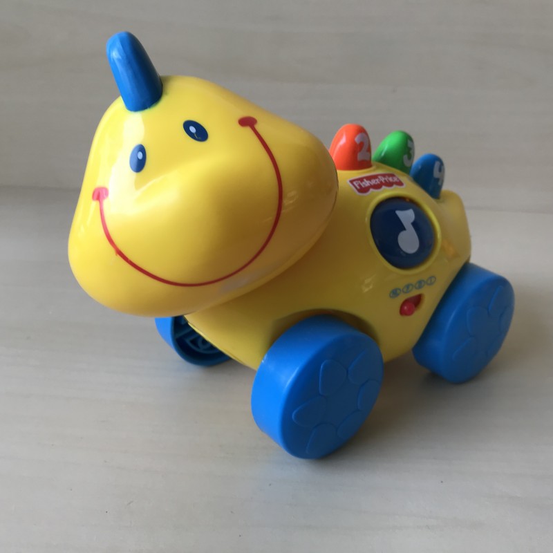 Fisher Price : muzikaal draakje. Tellen.