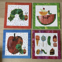 Eric Carle: Rupsje Nooitgenoeg : 4 puzzels. 4, 6, 9 en 16 stukken