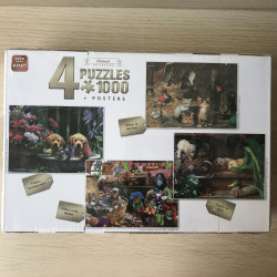 Doos met 4 puzzels van poezen en honden. Nieuw