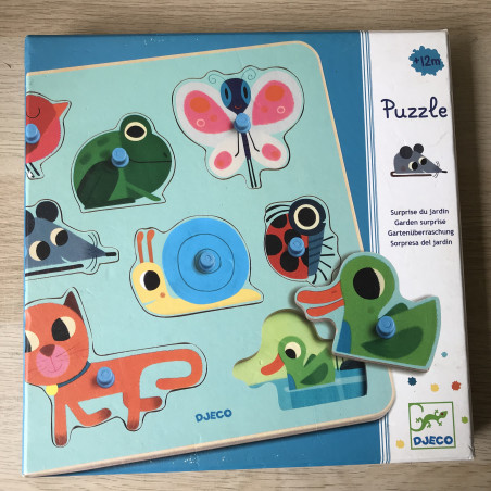 Djeco houten puzzel, knopjespuzzel.  Garden surprise. 8 stukjes