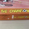 The Champion : puzzel 1000 stukjes. Deksel heeft beschadigingen.