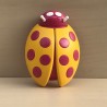 Lieveheersbeestje. Rammelaar. 10 x 8 cm.