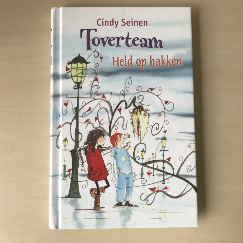 Toverteam. Held op hakken