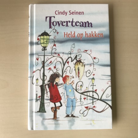 Toverteam. Held op hakken