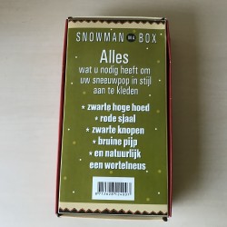 Voor de wintersport: sneeuwpop aankleding.
