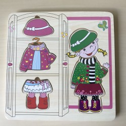Houten puzzelplankje Knopjespuzzel : Nieuw. Aankleedpopje.