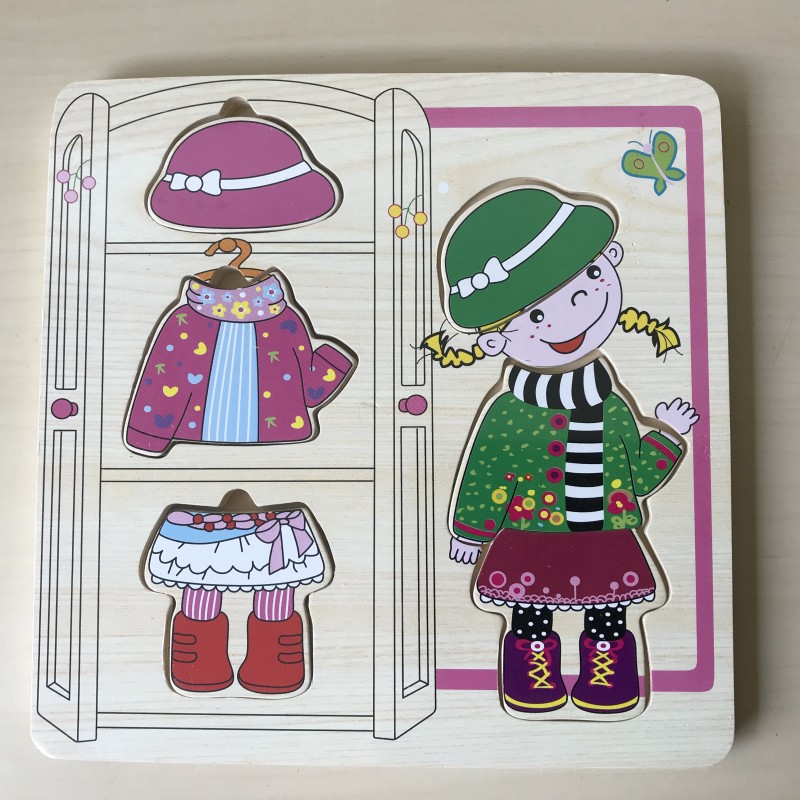 Houten puzzelplankje Knopjespuzzel : Nieuw. Aankleedpopje.