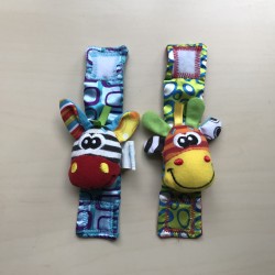 Playgro : Baby rammelaar stokjes en rammelaar armbanden.