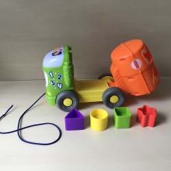 Fisher Price vrachtwagen met vormenstoof